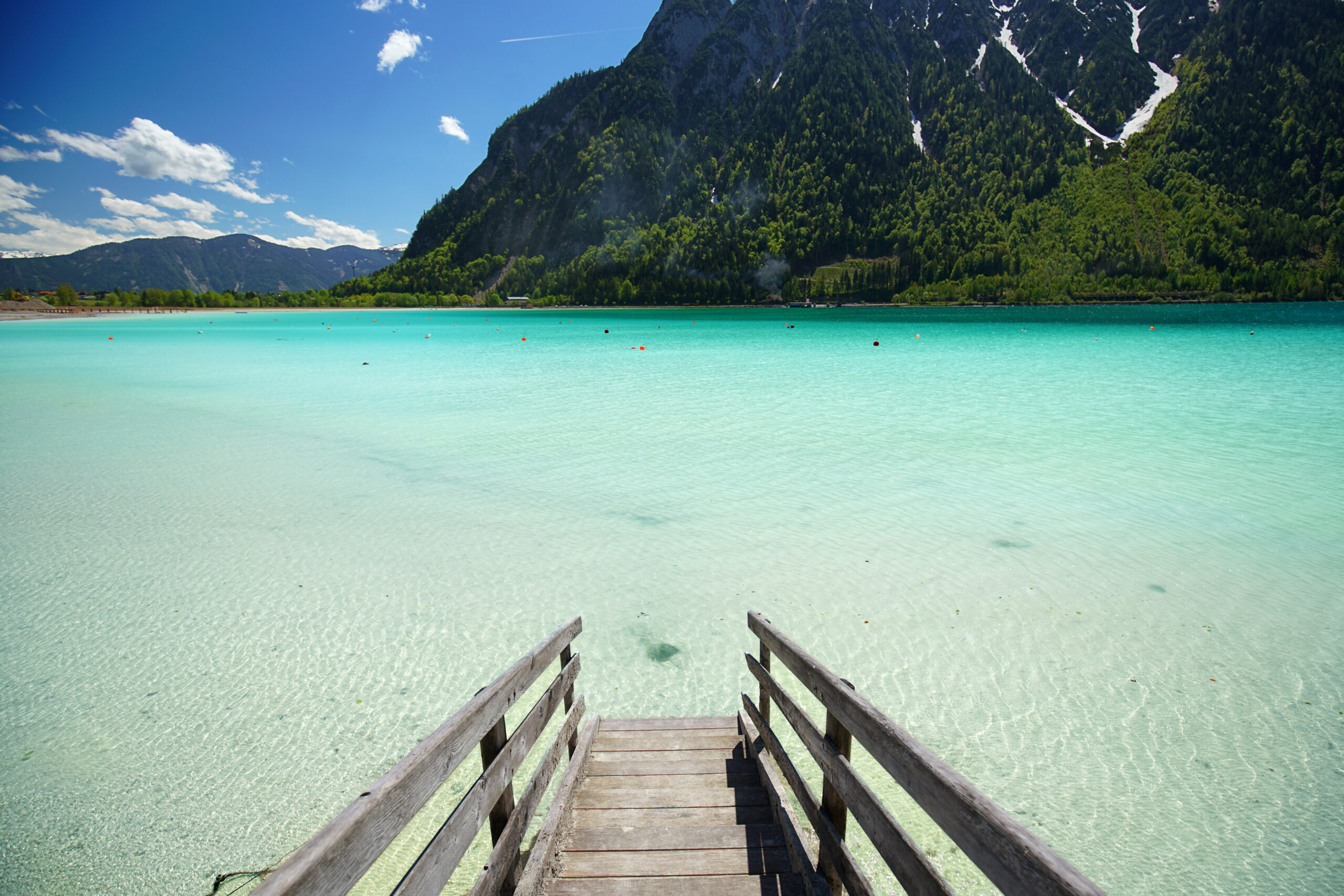 Achen lake turquoise water and Alps mountains view, Tyrol region of Austria