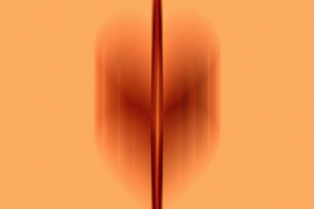 Herzgesundheit Symbolfoto, oranger Hintergrund, rostbrauner verschwommener Farbverlauf
